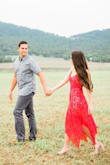 I love love loved this dress! I wore it for our engagement shoot and since red was a color we incorporated all the way from engagement to wedding day, it was a perfect way to tie in that pop of our favorite color! I ordered an XS in this dress and it was a perfect fit!! I felt so beautiful in this dress! - Alyssa D.