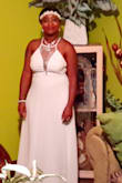 Dress worn to an all white event for family reunion! Dress had to be altered: it's too long and fits really tight when zipped up,but I managed to make it work! - Detoria S.