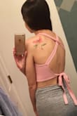 This top is super cute! I love the soft fabric and how the straps cross plus tie in the back. The pink is a fun spring and summer color... I'm planning on pairing it with high waisted light wash denim jean shorts and white sneakers or tan platform heals. You can wear it without a bra/sticky cups if you don't mind showing some nip bumps. I would like the fabric to be slightly thicker to reduce the nip factor, but it's not a huge deal. - Elizabeth S.