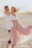 I wore this to have my engagement photos done, and I LOVED IT. It was absolutely perfect. It was fitted, but flowy which is exactly what I was looking for. - Jordan B.