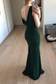 Great dress, perfect coverage for a wedding, gala or night out. It is long enough for someone my height (5'8) with a medium heel. Looks like a silk crepe, but has stretch and nice coverage. - Allyn R.