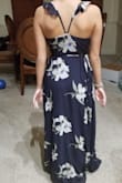 I love this dress. I bought it for my daughter to wear to a Havana Nights party and it was perfect. She wasn't completely sold at first but loved it once she saw the pics. It is very well made and the color and fabric were perfect. It photographs really well and looked stunning. It runs small, I bought her an XS and it fit perfectly however she is very petite. - Celinda P.