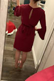 I wear this dress to work and always get compliments on it. It is very flattering and high quality material. I tie it both in the front and the back, but I do wish the the bow went all the way around the dress. - Elena T.