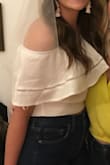 I wore this top for my bachelorette party that was fiesta themed. It fit perfectly and it didn't move around at all! I did not spend the night re-adjusting anything which I think is great! - Samantha R.
