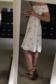 This dress fits perfectly! There is a second layer of fabric underneath so you don't have to worry about any see-through issues. I haven't worn it anywhere yet (as it's still cold here!), but I look forward to warmer weather when I can wear it! - Beth A.
