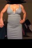 Very nice dress. It has thick material. The straps were a little bit long for me, but that was an easy fix. Try to wear the right underwear for this dress. As you can see I was just trying this dress on but will not wear a bra with it. - Isela V.