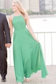 Wore this dress for engagement pictures and was shocked at how many compliments I got. It was very long even with three inch heels so I wish I got it hemmed but it's beautiful. Size down as it fits really nicely on top but would otherwise be large. - Elisa Z.