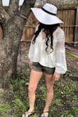 It fits perfectly. 
Material does not have any stretch to it but that's okay since it is flowy. It's just not a super comfortable material, but it's still comfortable enough to wear. Will definitely wear this throughout the summer! - Mandy K.