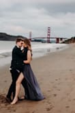 I love this dress so much! It was perfect for our engagement pictures and flowed awesome in the wind! On me the sleeves seemed a bit too loose and I had to secure them with some fabric tape, but that's my only complaint. On the size chart it said that i would be an XL but after reading the reviews I decided to size down, and I'm glad I did! The quality on this dress is awesome, and I'm so excited to wear it to other events. - Talia P.