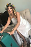 I wore this dress for my bridal shower and it was stunning! The fabric quality was so much better than anticipated and it really did fit true to size. I'm 5'6" and wore about 3.5" heels. It gracefully swept the floor (perfect for me). The dress even had a cute leg slit which made it sexy-sweet while opening gifts! Do not hesitate to purchase this outfit! - Joslyn M.