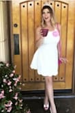 Wore this dress for my bachelorette party. Super sexy-sweet and the quality was amazing! Also, I purchased stick-on bra cups so there were no peek-a-boos. For some with lighter "areas" you might be able to pull it off without a bra since the dress is pretty thick. - Joslyn M.