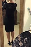 I normally wear size small in tops and dresses but this dress was too loose on me in a size small. Instead of hugging all my curves, this dress just flattened everything out into a bland black look. If you're looking for a very modest dress, this would be it. I returned it because it's not as flattering on my body type as I had hoped. - Yelena S.