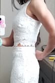 I loved this dress and so did my fiance but the floral overlay material was too pooch-y for me so I sent it back. It didn't sit smooth over the body like it does on the model. Maybe part of it was that it was fresh out of the shipping package? - Gabrielle P.
