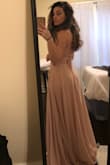 I was a little worried about buying a dress without trying it on, but this fit just right (minus the length - but I expected that) the waist is stretchy so it fits comfortably. Very light fabric - I'm using it for a wedding in Greece. - Vicky K.