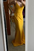 I ordered this dress for my prom but unfortunately it didn't fit. It's a really nice and simple dress and I love the color! However, it was a little big on me so I would need to get an xs. Overall, a really nice quality dress for the price. - Michelle R.