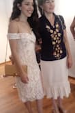 Actually, this dress is beautiful. I used it in my civil wedding, they all loved it. The material is of a high quality. I recommend it. - Cinthia M.