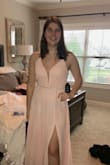 His dress is lovely. My daughter loves the back and the touch of sparkle at the waist. - Stephanie K.