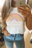 Love this t shirt! It's really soft and comfy. I love love the bright colors! It is a little bit more baggy than I thought it would be, but I like to tuck in or tie my t shirts anyway so it's perfect for me! It looks cute with jeans and skirts! - Erin W.