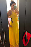 I originally purchased this a) because I love the true sunshine yellow and have been looking for a yellow formal dress for a while & b) as a potential for my bridesmaids' dresses. I ordered both the XS & S, the XS was a little too tight around the band. Ultimately I'm keeping the S and will be using it for engagement pics. The color is really a true beautiful yellow, not mustard, green-toned, dull, or neon. The cut looks fantastic on, substantial but not to heavy. - Noel C.