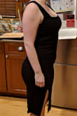 The material on this dress is a lot thicker and higher quality than I was expecting. It is not as strechy of a fabric as I thought, but I do love the quality and the design. As you can see from the pictures it fits a little too tight on me but is overall still pretty flattering. I took the picture after dinner, bloated from PMS, wearing no control panties or Spanx and I don't hate myself in it, quite the accomplishment! I was also wearing a full coverage bra which is why you see it peeking out the top. (I'm a 32G/H). My measurements are 38 - 29 - 38 for hips, waist, and chest. Honestly, although I feel like I do need to loose a little weight to make it look perfect I would still wear this with some control top undergarments as I am today. To the point that even though I'm not at my ideal weight, I want to buy it in the blue as well! - Carolina M.