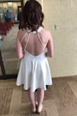 I used this dress for my wedding, and I received so many compliments. It was gorgeous! I instantly fell in love with the open back when I first tried it on. The front was also perfect for wedding photos as it was elegant but simple. - Valerie K.