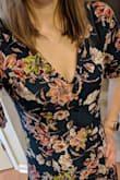 Love this dress! Fits a little looser, but the relaxed fix makes it so comfy. 
(Looks blue in the pictures but is a darker green) - Kristi F.