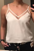 I couldn't pick one color so I purchased the black and white and I love them both!! They're such great layering pieces that can work with so many outfits. It's the right about of sexy and classy and the white isn't sheer. I did tighten the straps on both when the arrived but otherwise they fit perfectly! - Sarah L.