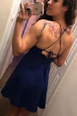 This dress fits like a glove! I have an athletic build and it's often hard to find things that fit just right... the back allows you to adjust it to fit your particular shape so there's no gaps or uncomfortable areas. And the material is great quality! Highly recommend! - Ariel B.