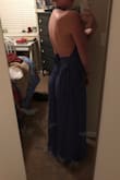 Completely in love with this dress. It's a super comfortable fabric and the dress style is extremely flattering! With the low back you can't really wear a bra with it so keep that in mind. The way you put it on is kinda funky; it completely opens in the front so you wrap it around, but it works great so I have no complaints! - Avalon L.