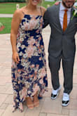 The dress was so much fun to wear for a wedding I went to. Normally a medium and I purchased a medium. Was tight at the chest area but got a little looser the longer I wore it. Def would size up if you have larger breasts. - Amb M.