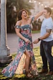 I chose this dress for the casual part of our engagement shoot. It is the perfect combo of romantic, comfortable, and good quality! I love how the colors pop and the sexy slit on the side makes the dress flow. It is dry clean only, which is fine because I want this dress to stay perfect as long as possible. The cap sleeves are comfortable too. I wasn't a fan of maxi dresses until now and can't wait to wear it again! - Molly S.