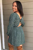 I was a little nervous to order because I wasn't sure if the dress would be long enough or fit me in general. I LOVED it as soon as I tried it on. I wore it for my birthday and would highly recommend it. The band around the waist is elastic so it's very comfortable. The dress hit right above me knees. - Charnay P.