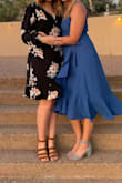 Beautiful dress! Took me a couple minutes to figure out how to put the darn thing on. It is a wrap dress and SUPER comfortable! I got so many compliments at the wedding I attended. - Hannah N.