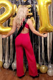 I bought this jumpsuit to wear for NYE and my 21st Birthday evening! I ordered in red and the blue to see which I liked better. Giving a four star because when I tried both on for comparison, they both fit completely differently. The blue was way to big and the red fit just right. Good thing I liked the red better! Anyways I loved this jumpsuit it was perfect for the occasion! The material is great and comfy, it was a great piece for the price. - Brooke M.