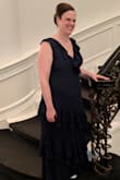The dress fitted perfectly. I wore it to my friends wedding. I loved, loved the ruffles on the dress. I also loved the color. I felt so elegant in the dress. - Brenda S.