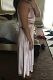Great quality dress! I'm normally in between a small and medium size dress, but wrap dresses always have extra room. I got a small and it was a perfect fit even for a more busty girl. The material on the chest is a little thin, so I'll definitely have to wear some petals or something. The dress is a little long on me, but it looks more like a high low maxi dress on me.I don't have to get it hemmed! Overall would recommend. - Danica Z.
