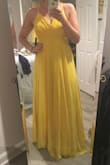 This dress was the perfect fit and length that would flatter many people's figures. The color was that perfect yellow that is nearly impossible to find and the top layer of soft tulle made this look so romantic. Unfortunately, I ordered it as a bridesmaid dress for a wedding and the bride changed her mind on the color, so I had to return it. - Kayli W.