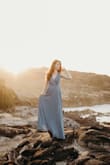 Dress was gorgeous, but needed fashion tape! Sticky bra was constantly showing... but received so many compliments! - Chloe A.