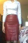 This shirt is so beautiful!! I originally bought it in a medium but could barely get the skirt over my butt. I re-ordered it in a large and was nervous it wouldn't fit my waist but it ended up fitting perfectly. This skirt is so sexy and it's long enough to still look professional!! - Meghan M.