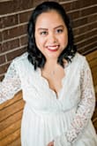 I went through a ton of reviews to make sure that I can get the right fit for the dress! I always struggle with dress sizes, usually I'm in between sizes. This dress was gorgeous!! The lace wasn't as delicate as I thought it would be, which I loved. I originally ordered an XL based on the size chart and other reviews. When I received it, the dress fit perfectly at the waist, but the arms and length of the dress was way too long! So I ordered a L and the arm length was just long enough that it didn't need to be altered, it wasn't skin tight on me, which I also preferred, and the leg length was the length that I'm used to with buying long dresses. (I've perfected the kick and step method to avoid having to alter dresses). The waist was just slightly too snug, but the nice thing about the way this dress flowed was that it didn't feel like I wouldn't be able to move or breathe because of it! I ended up going with the L for my elopement. It was this past February, in the middle of a snowy winter, so I had to buy a faux fur shawl to go over it, but this dress is exactly what I was looking for! - Kristien K.