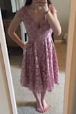 This is a really fun dress! I love that it has an open back, and I didn't need to wear a bra with it so that's really convenient. The color is really gorgeous too. The back clip on the bottom is difficult to latch on your own, so have a partner to help when you're getting ready. The sides are a little funky though and you have to pull the dress down to straighten it due to the backless design, but overall, the dress is so cute! I cannot wait to wear it! - Kassie B.