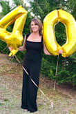 Great jumpsuit! Very flattering! My only issue was the length. It was way too long with 3 inch heels, so I had to have it hemmed. It was totally with it! - Amanda F.