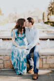 I bought this dress for my engagement photos and it fit like a dream. Even with a smaller chest, it wasn't too wide at the top and fits your curves nicely. It even has a secure tie in the inside of the waist before you do the wrap tie to ensure the dress stays together. The turquoise is beautiful and the quality is very good and a nice material. Perfect for spring or summer. - Erin T.