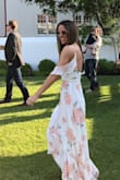 I feel like a goddess in this dress! It's snug in all the right places, giving you some great structure (and cleavage!) yet still with enough give to be comfortable up top, and beautifully flowy on the bottom. Had to get it hemmed a bit but I wore it for my rehearsal dinner and am absolutely in love with it! - Meg L.