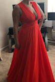 The color and subtlety of this dress was absolutely stunning. I wore this to a wedding and everyone had to stop to compliment my dress. The color was a perfect coral which complimented the island wedding. I loved that it was subtle about showing my bust, I almost wished it showed some leg! I always have a hard time finding something that fits my waist and also my chest since it is on the bigger end but this was perfect. The top was actually a little loose, I purchased some bust tape from brassybra and it worked out.  It's usually difficult for me to find long dresses but this was almost too long! It fit perfectly when I wore my heels but when I had to tie it up on the side slightly when I switched to flip flops to get on the dance floor. I've never purchased from Lulus and this dress confirmed that I'll be making this my new go to store for elegant outings and maybe everything else! - Nadine D.