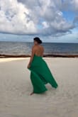 I bought this dress for a beach wedding last August, and loved it! It was flowy and the back was gorgeous. Wear adhesives with it and you're good to go. The only thing is that it is VERY long. So I am kinda tall, 5'7, and it ran probably 2 inches too long. - Candace L.