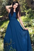 This dress fits well. It's really long and perfect if you're going for a whimsical look. - Julie G.