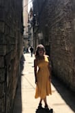 Wore this around Barcelona and fit right in! Swing and flare made it feel a little retro. Totally adorable, but a tiny bit tight around the bust. - Emily M.