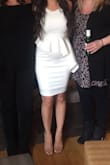 I wore this to my baby shower when I was 20 weeks pregnant. It was perfect to "hide" the bump (since I was in that awkward kind of showing phase). - Alexis B.