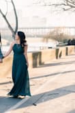 This dress is so versatile and Easy to wear. I wore this in Paris for engagement photos and felt like a queen. It drapes beautifully and flows in the wind. I did have it taken up quite a bit because I'm short and this dress rubs long. I can't wait to wear this again at a wedding next month! - Noellia H.